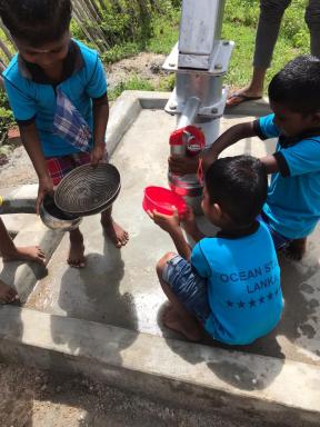 Children at the new well