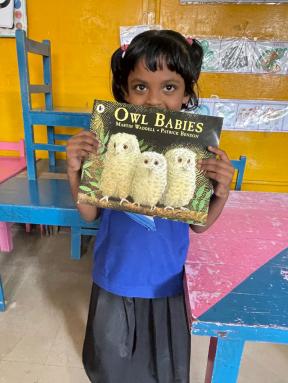 School girl with story book