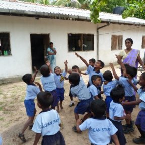 Blowing bubbles in Chenkalady, Sri Lanka